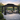 Black metal outdoor hardtop gazebo with mosquito netting